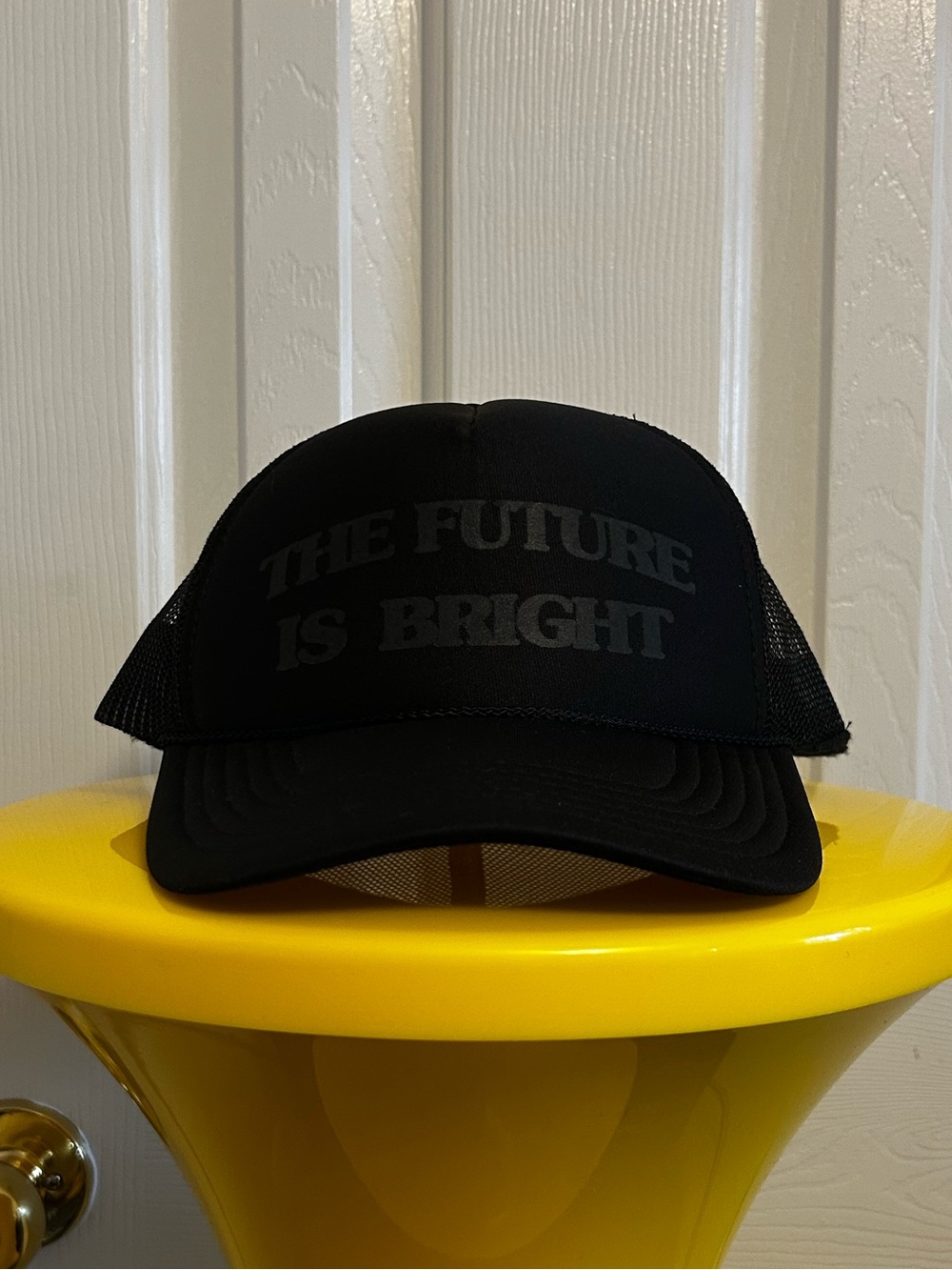 Black Trucker Hat with "THE FUTURE IS BRIGHT" Text